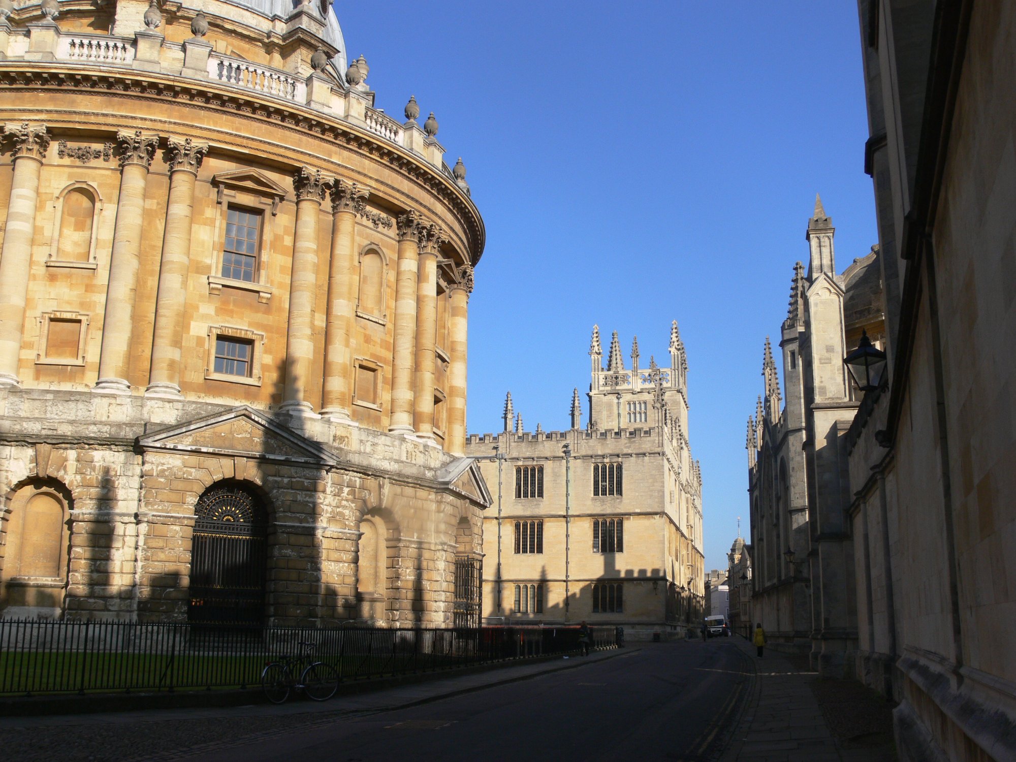 Radcliffe Square, Oxford — the Radcliffe Camera in the foreground with the Bodleian Library's Tower of the Five Orders rising behind it