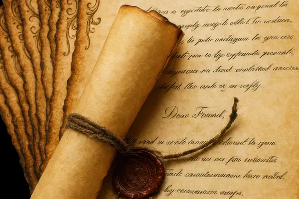 Rolled parchment scroll with wax seal